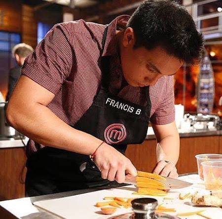 Francis Biondi competing on MasterChef, wearing his contestant apron